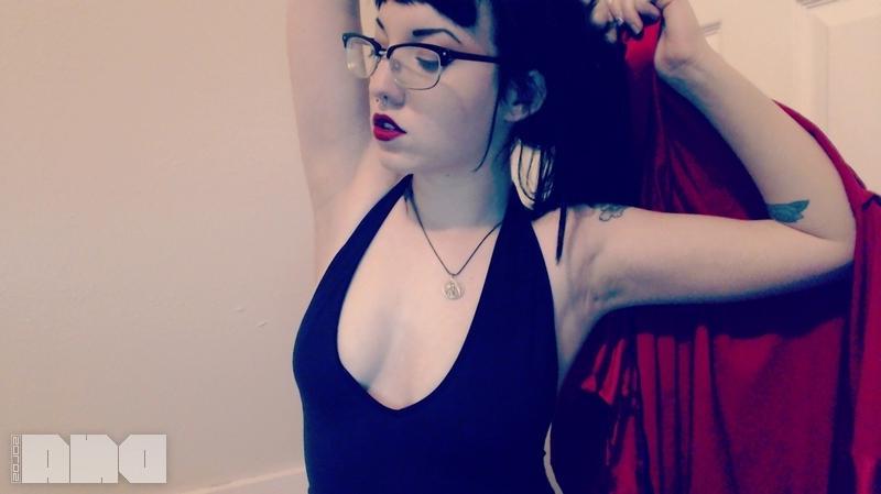 15P Pinup girl Jesse Caits gives you an artistic striptease