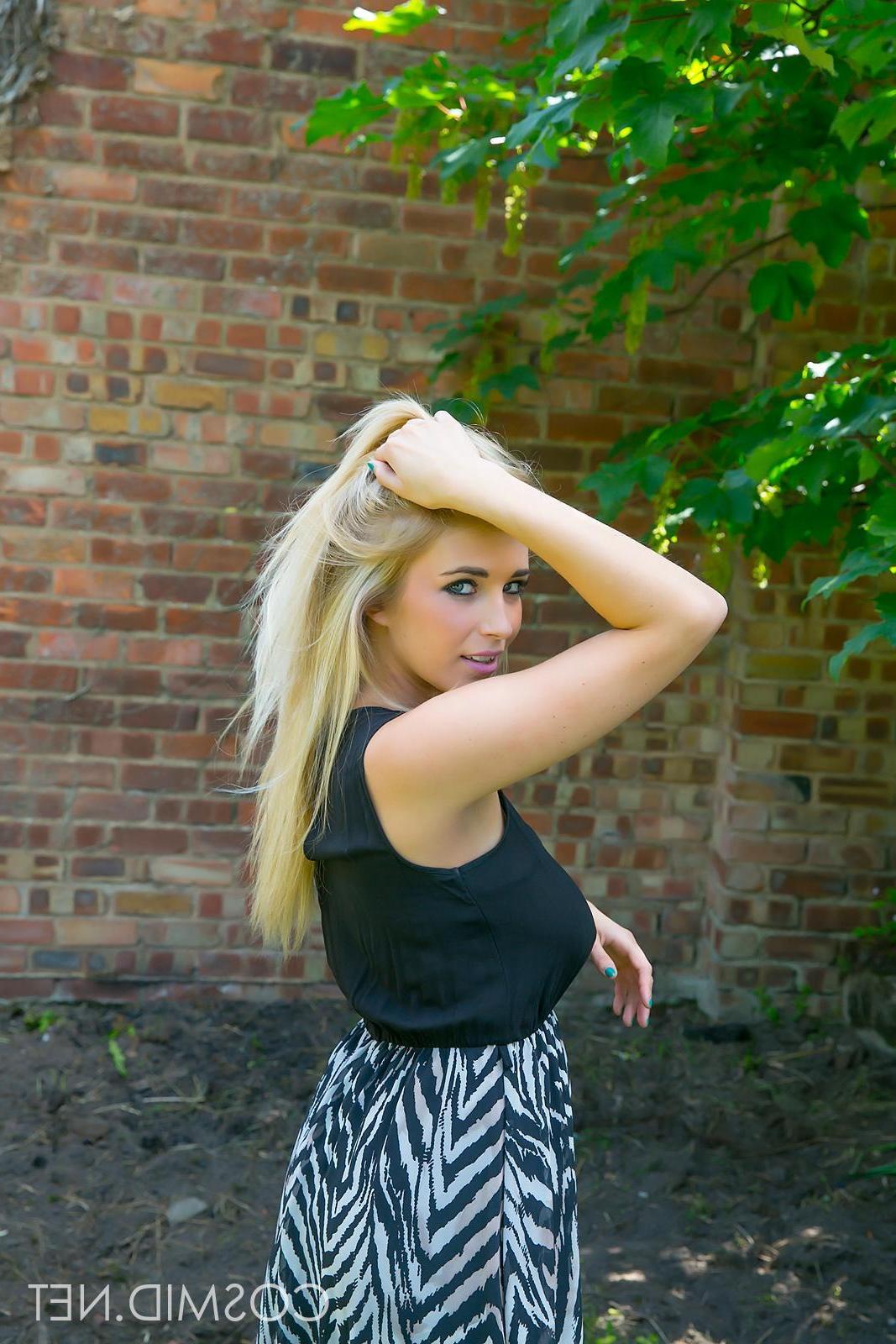 16P Busty babe Jodie strips off her black dress outside