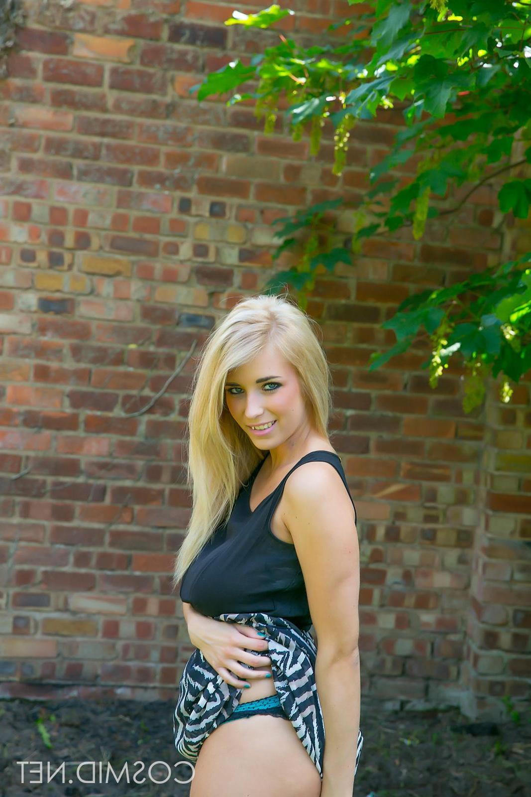 16P Busty babe Jodie strips off her black dress outside