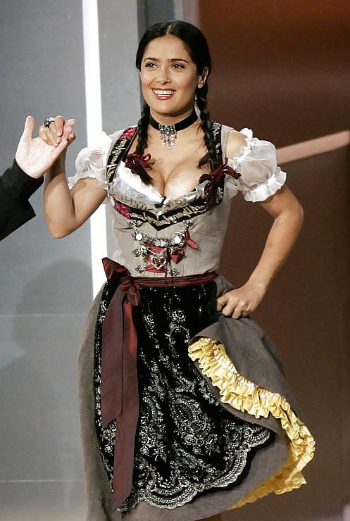 16P Salma Hayek with deep cleavage.
