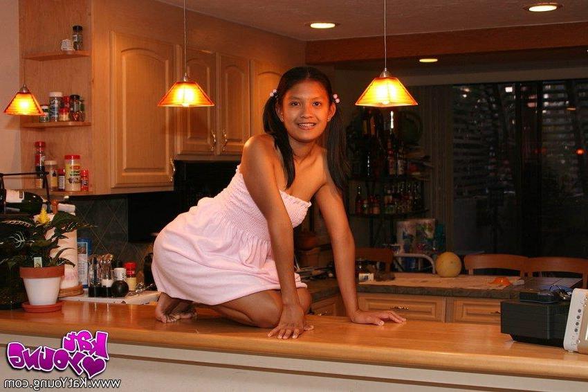 20P Kat Young does a strip tease in the kitchen wearing her night shirt