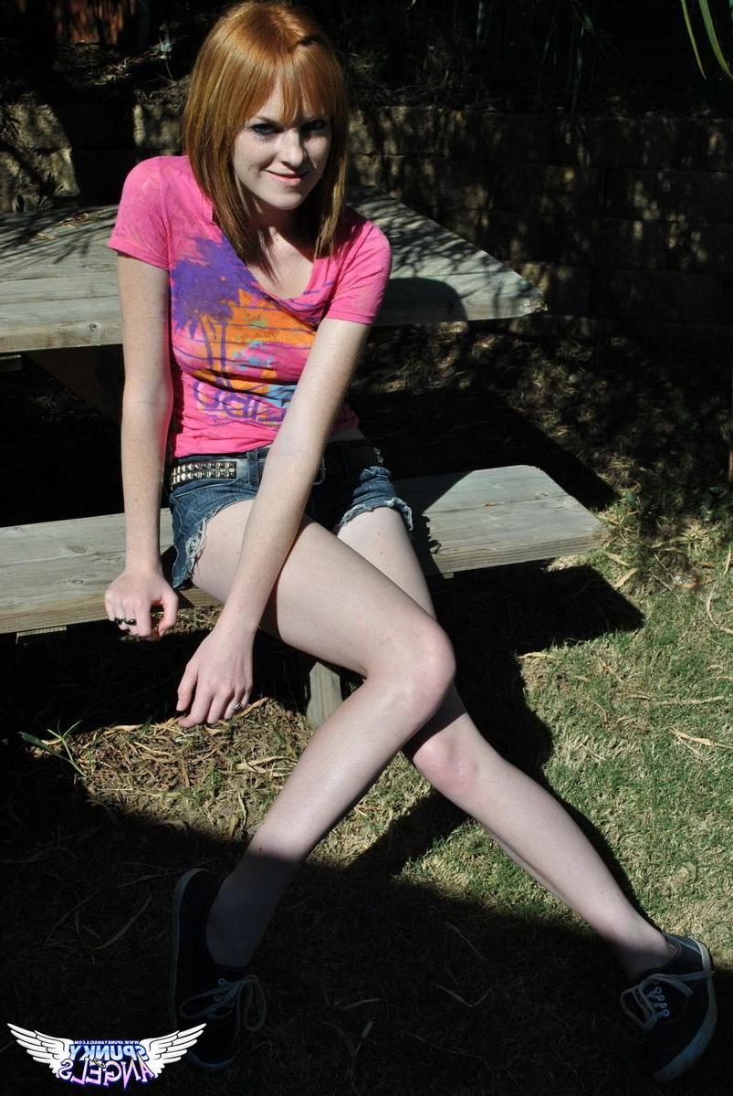 20P Redhead teen Kate Cooper flashes her pussy for you outside