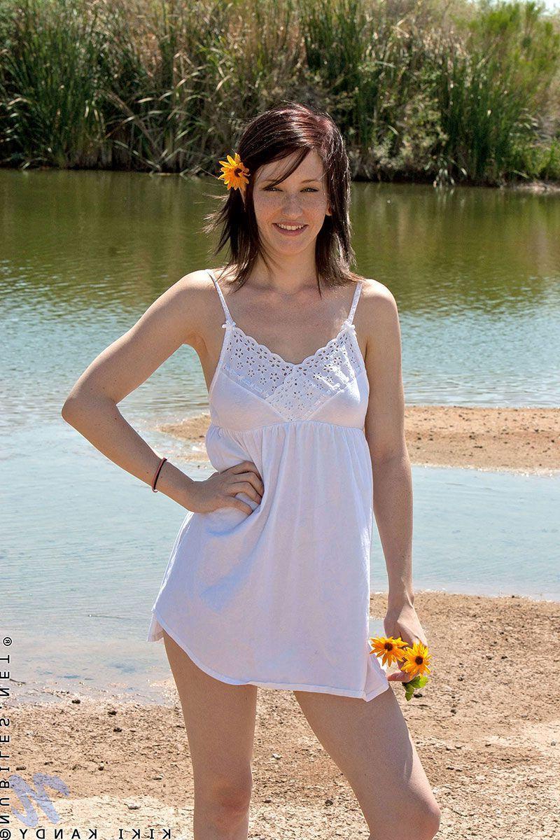 20P Pictures of redhead teen Kiki Kandy being a cock-tease