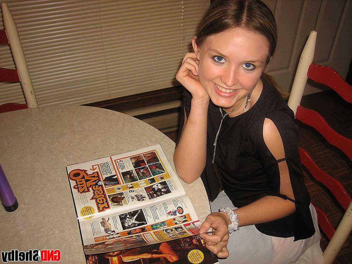 12P Horny teen Shelby strips off all but her black nylons and toys her tight little pussy