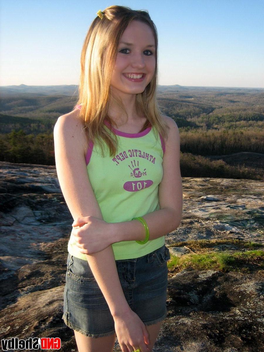 12P Perky teen Shelby flashes her perfect tits while on top of a mountain in a public park