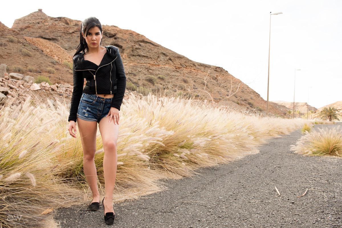 16P Brunette hottie Lady Dee gets naked outside in "Travelling"