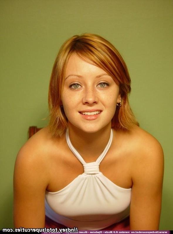 15P Lindsey shows you her sexy pierced nipples