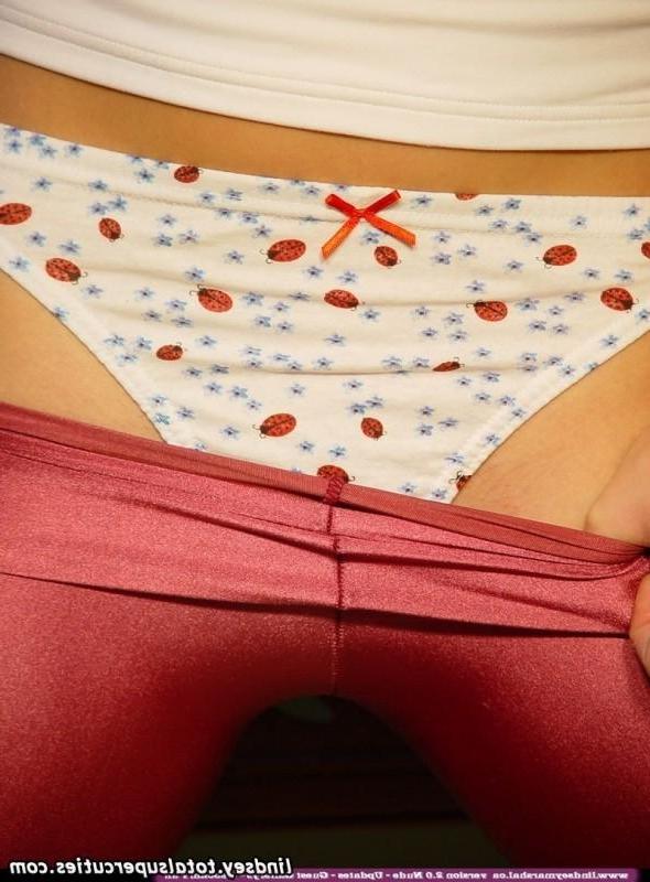 15P Lindsey shows you her sexy pierced nipples