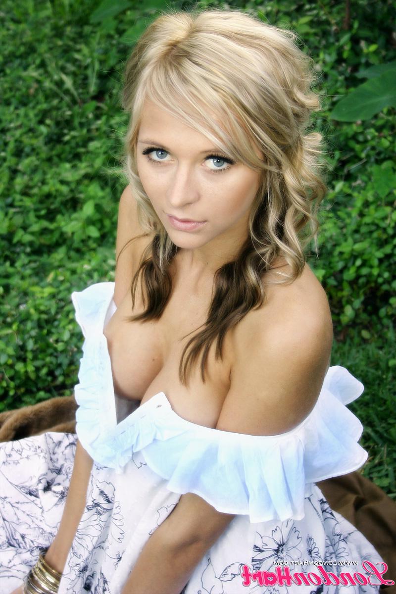 20P Pictures of London Hart teasing in a pretty dress