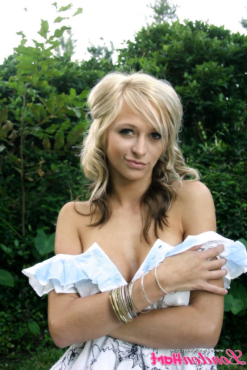 20P Pictures of London Hart teasing in a pretty dress