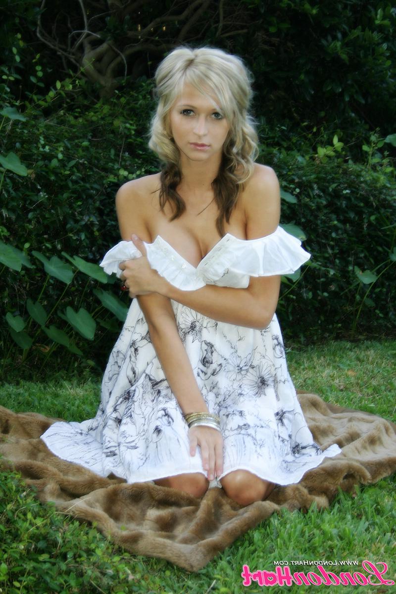 20P Pictures of London Hart teasing in a pretty dress