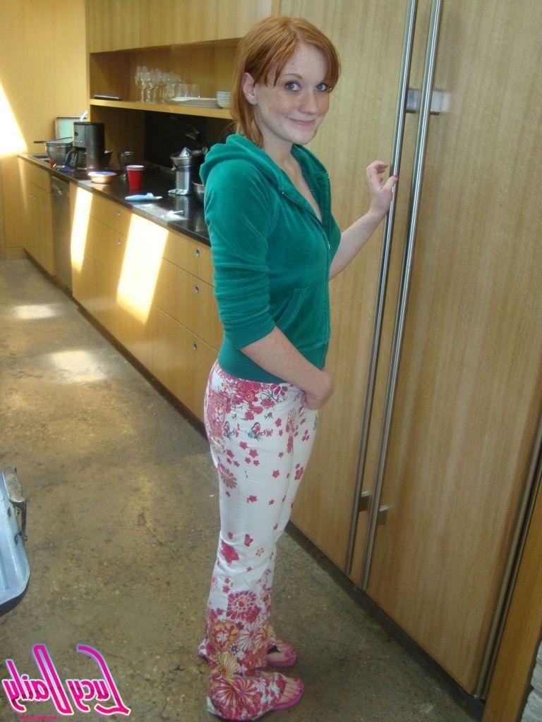 20P Pictures of teen cutie Lucy Daily teasing in the kitchen