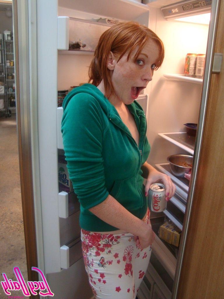 20P Pictures of teen cutie Lucy Daily teasing in the kitchen