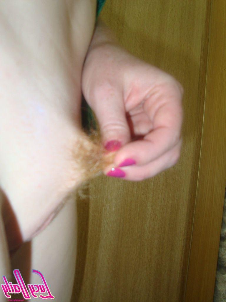 20P Pictures of teen cutie Lucy Daily teasing in the kitchen