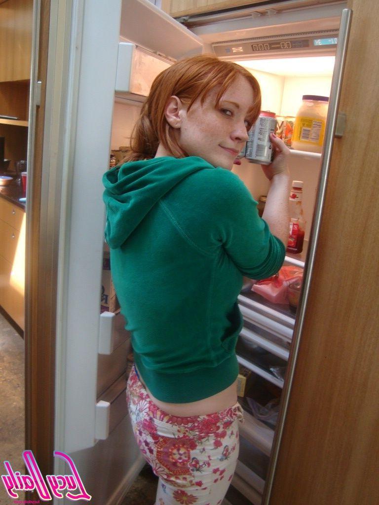 20P Pictures of teen cutie Lucy Daily teasing in the kitchen