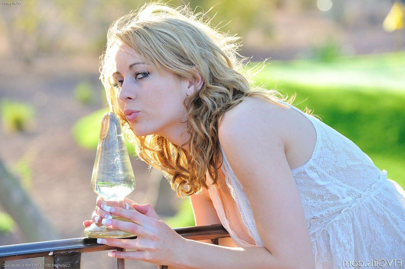 15P Pictures of Mealynn riding a glass dildo outside