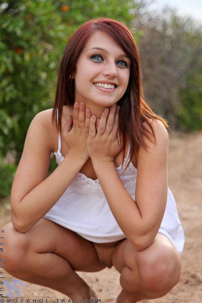 20P Pictures of teen babe Mary Jane Johnson getting naked outside