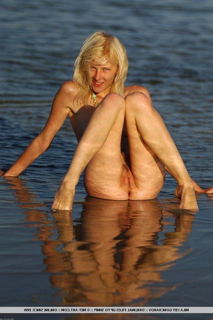 18P Pictures of Mila I getting all wet outside