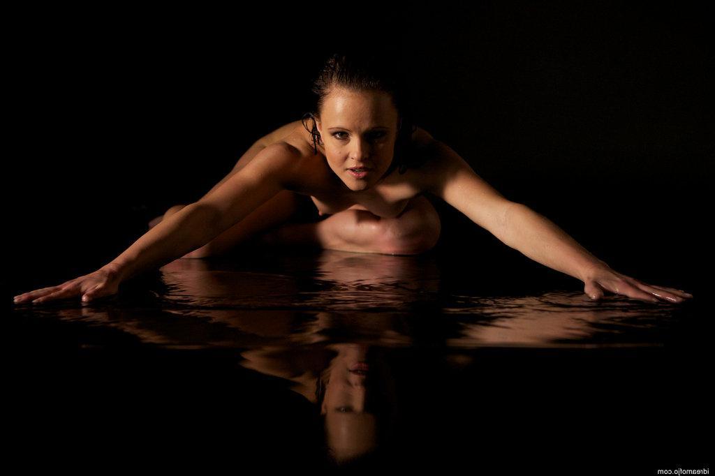 16P Sexy brunette girl Monica Sweet strips naked on a wet floor