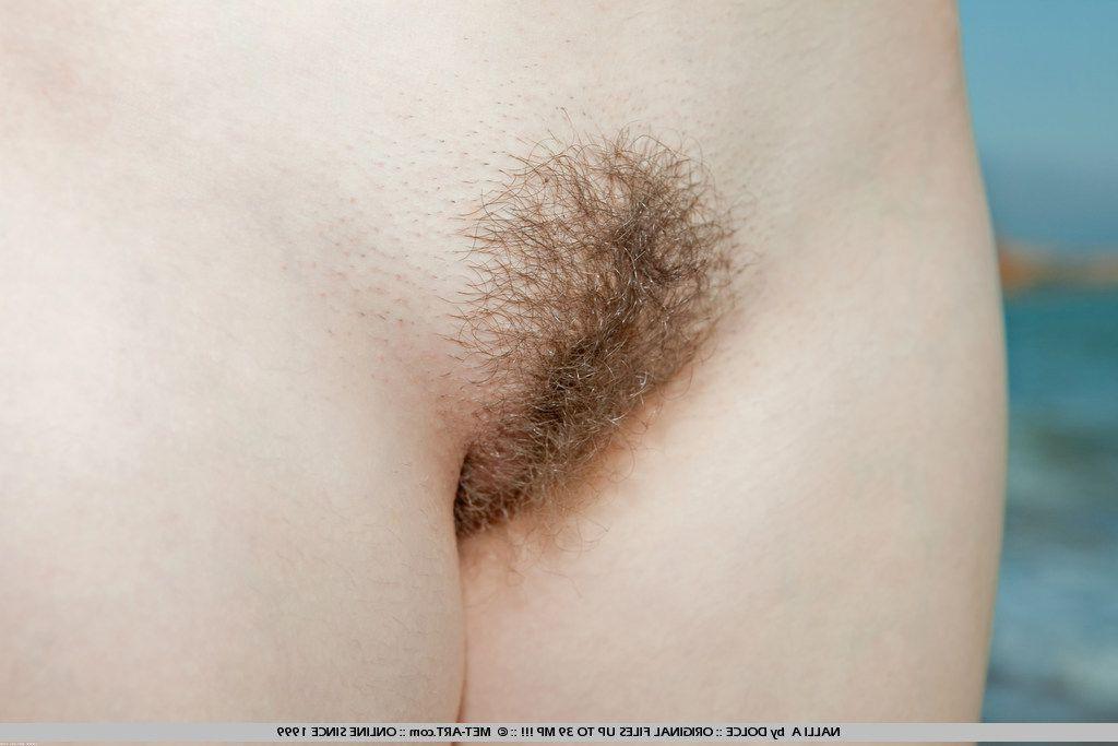 19P Pictures of redhead teen Nalli A all naked on a beach