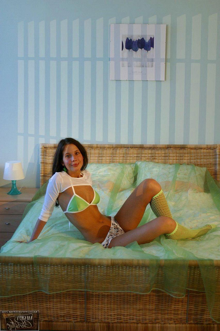 15P Pictures of Naughty Christine spreading for your cock