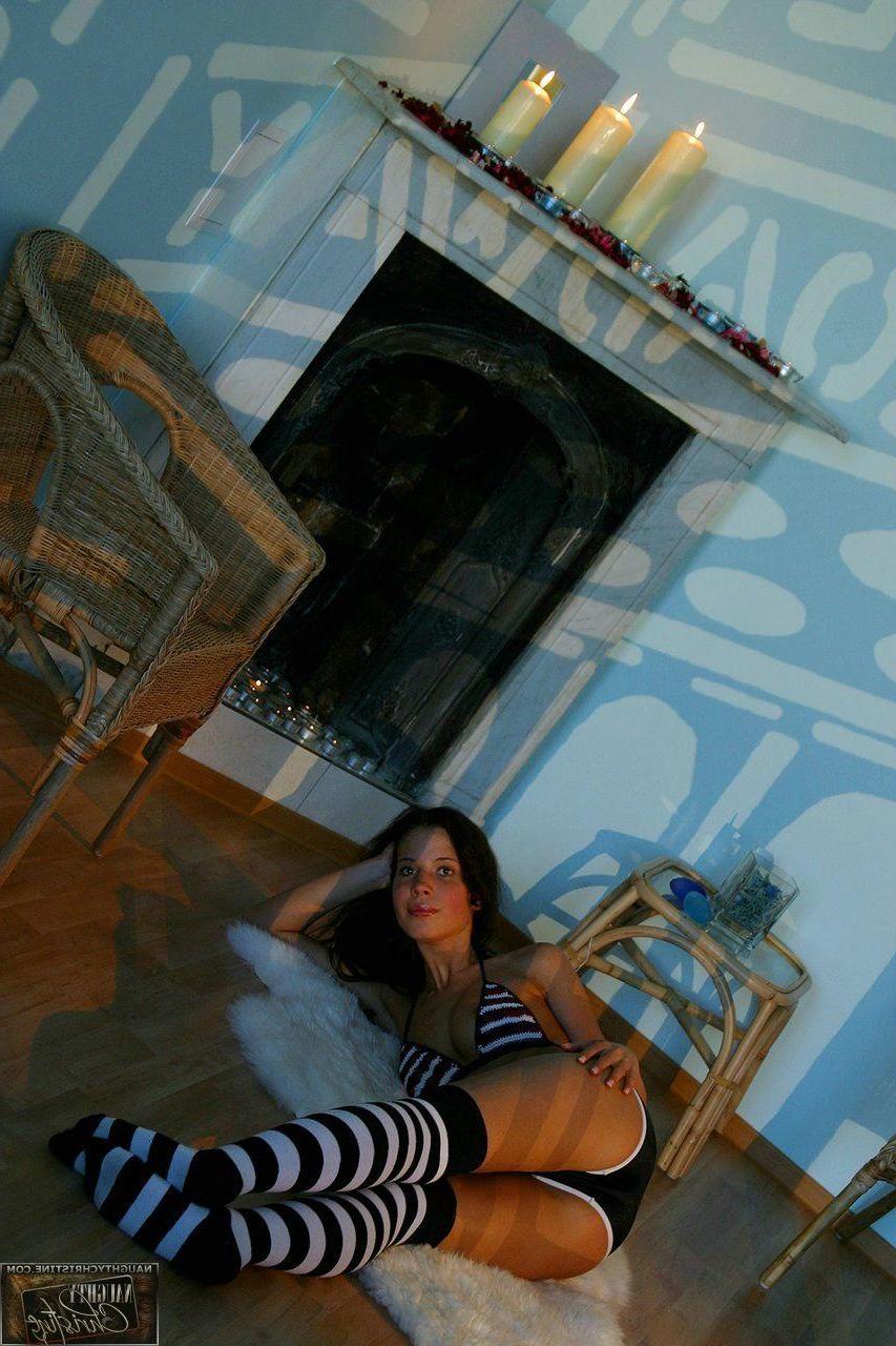 15P Pictures of teen cutie Naughty Christine wearing striped socks