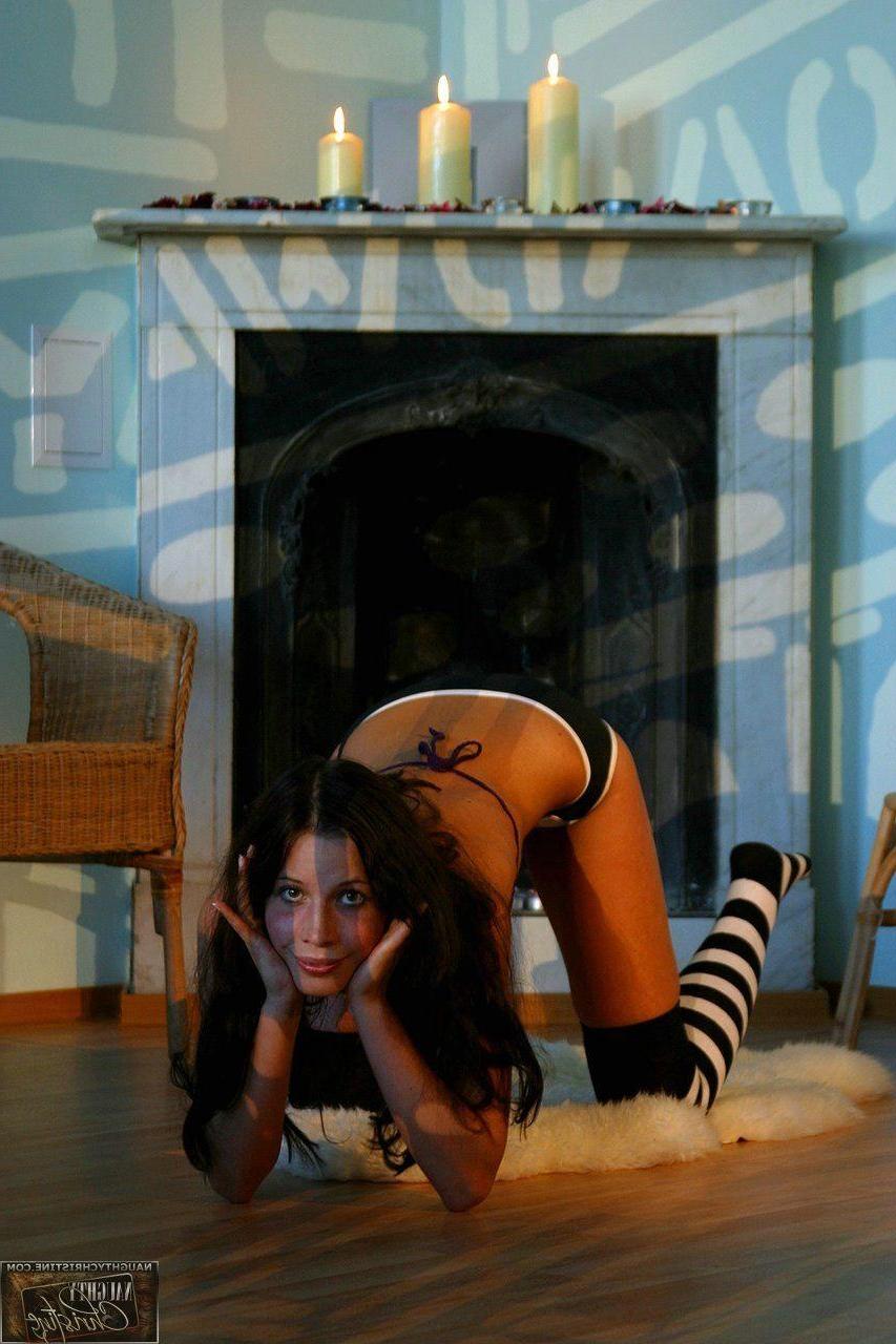 15P Pictures of teen cutie Naughty Christine wearing striped socks