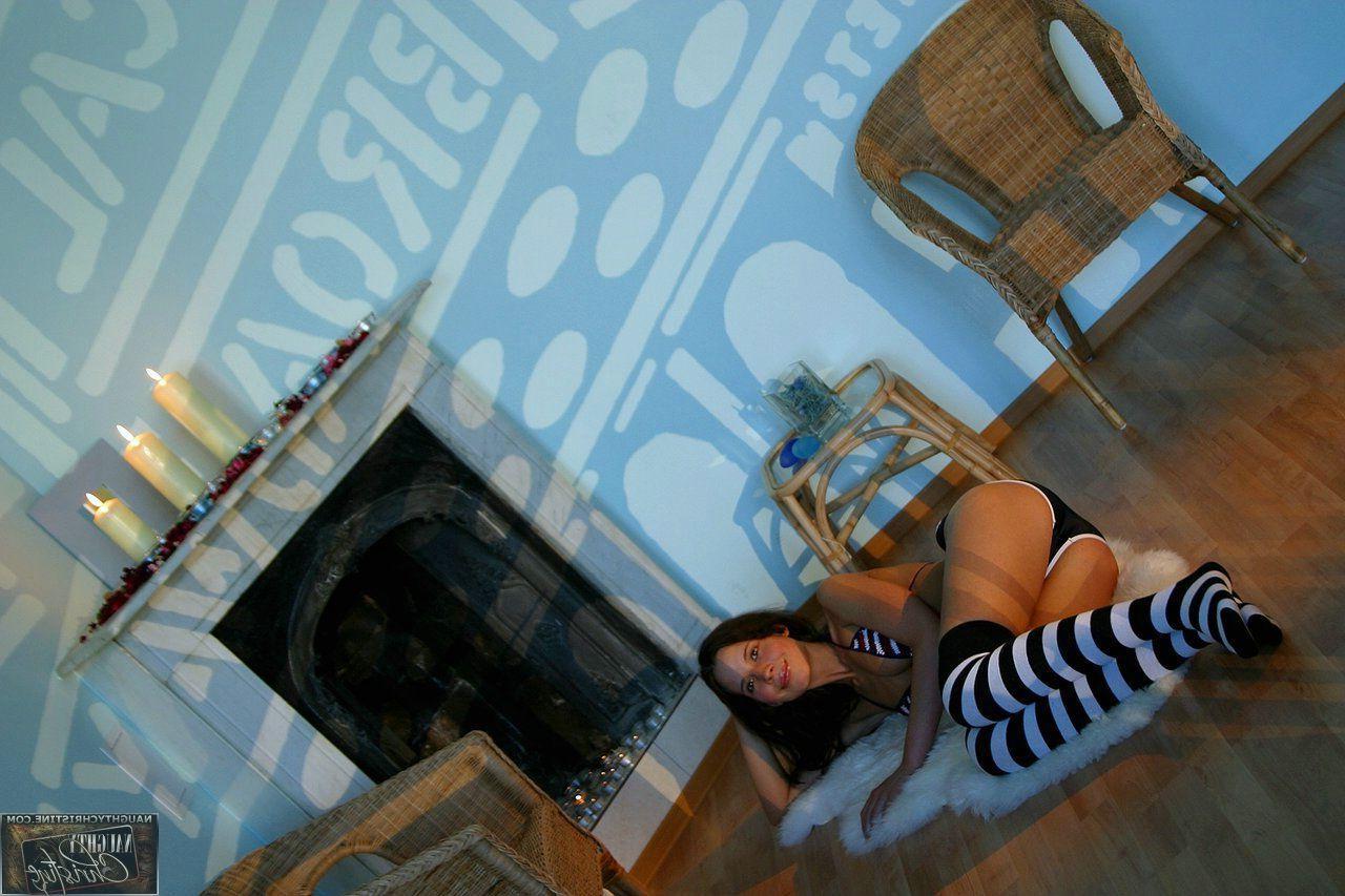 15P Pictures of teen cutie Naughty Christine wearing striped socks