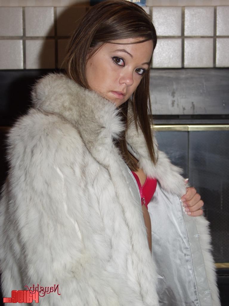20P Pictures of Naughty Paige staying warm by the fireplace