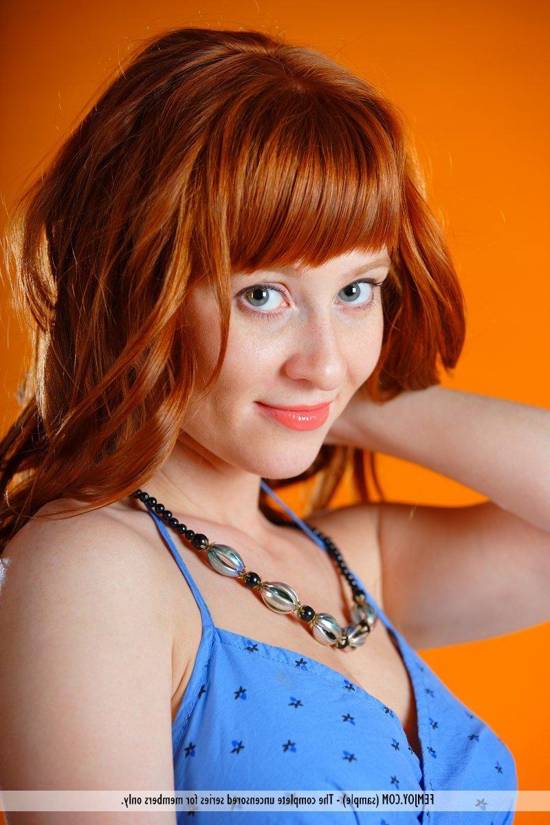 16P Pictures of redhead teen Ossana showing how the carpet matches the curtains