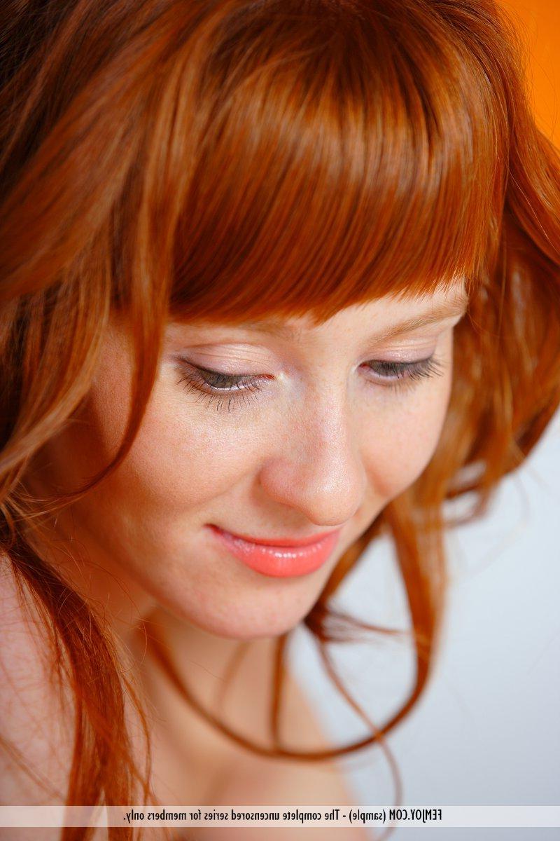 16P Pictures of redhead teen Ossana showing how the carpet matches the curtains