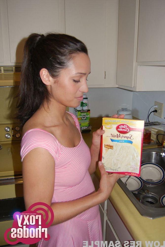 15P Pictures of teen cutie Roxy Rhodes getting naughty in the kitchen