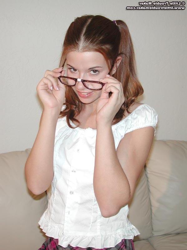 20P Pictures of a schoolgirl showing you her pussy