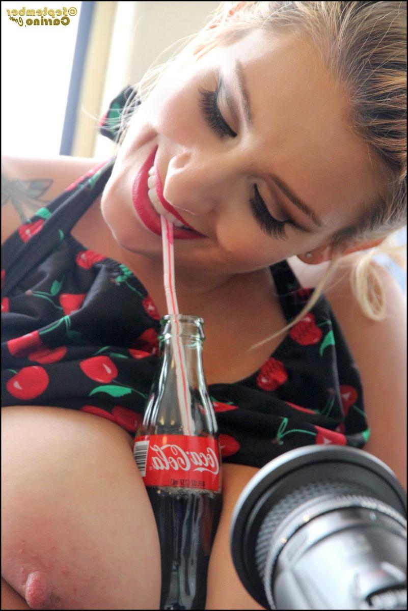 15P September Carrino expoes her big boobs in a sexy retro set