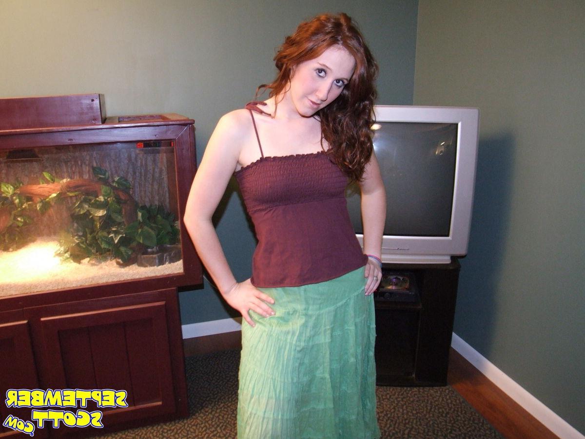 16P Pictures of September Scott playing with her redhead pussy