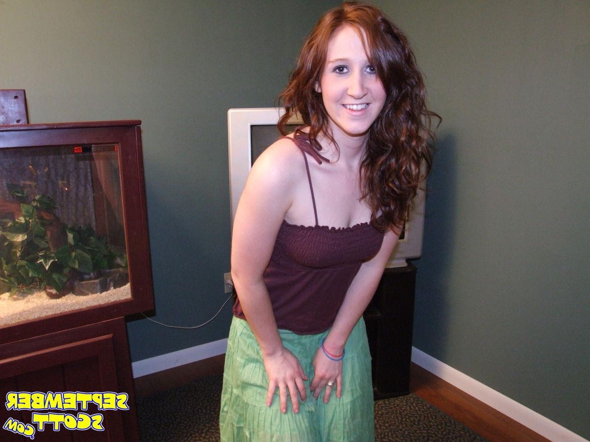 16P Pictures of September Scott playing with her redhead pussy