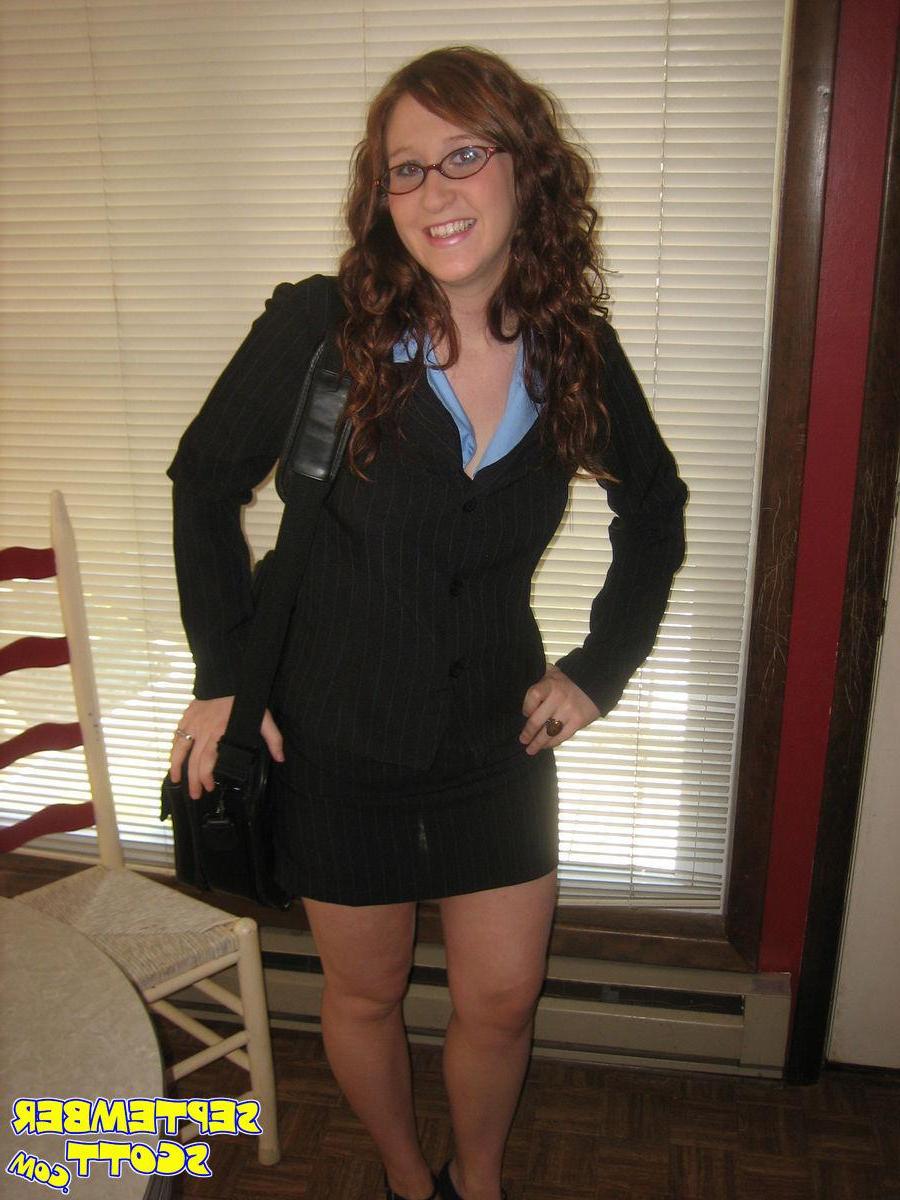 16P Pictures of redhead teen September Scott playing with a vibrator