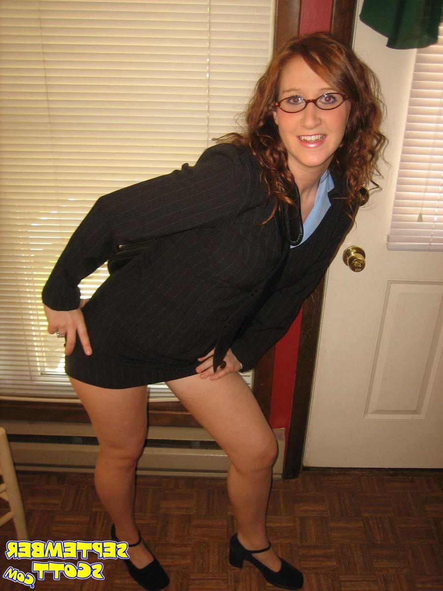 16P Pictures of redhead teen September Scott playing with a vibrator