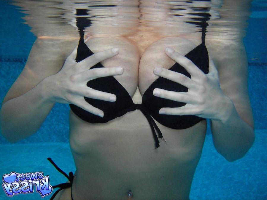 12P Busty babe Krissy goes skinny dipping in the pool