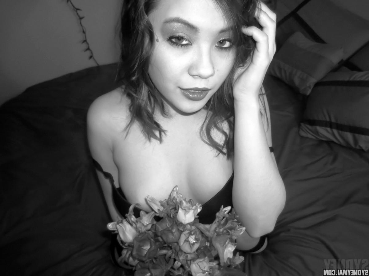 15P Asian babe Sydney Mai plays with her wet pussy in black and white