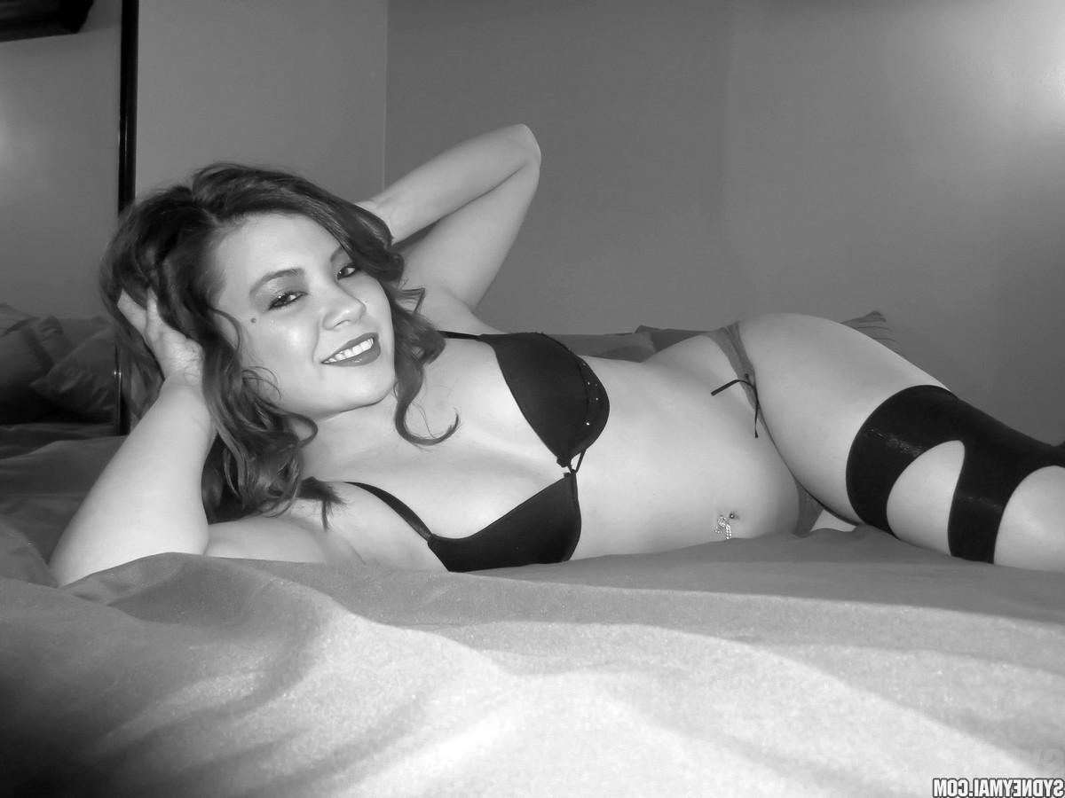 15P Asian babe Sydney Mai plays with her wet pussy in black and white