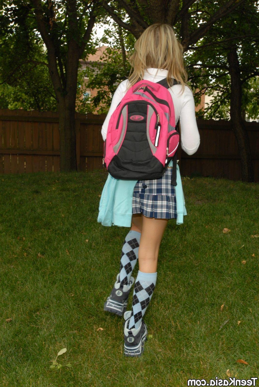20P Pictures of Teen Kasia being a naughty schoolgirl in a park