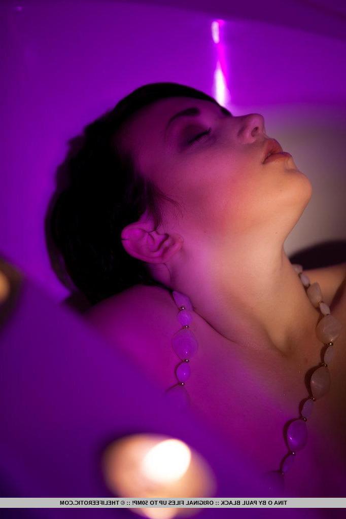 16P Pictures of brunette teen Tina O masturbating in candle-light