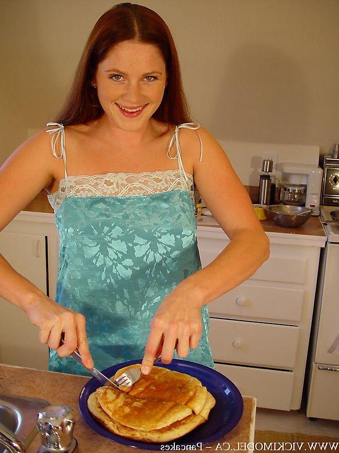 20P Pictures of teen star Vicki Model getting naughty in the kitchen