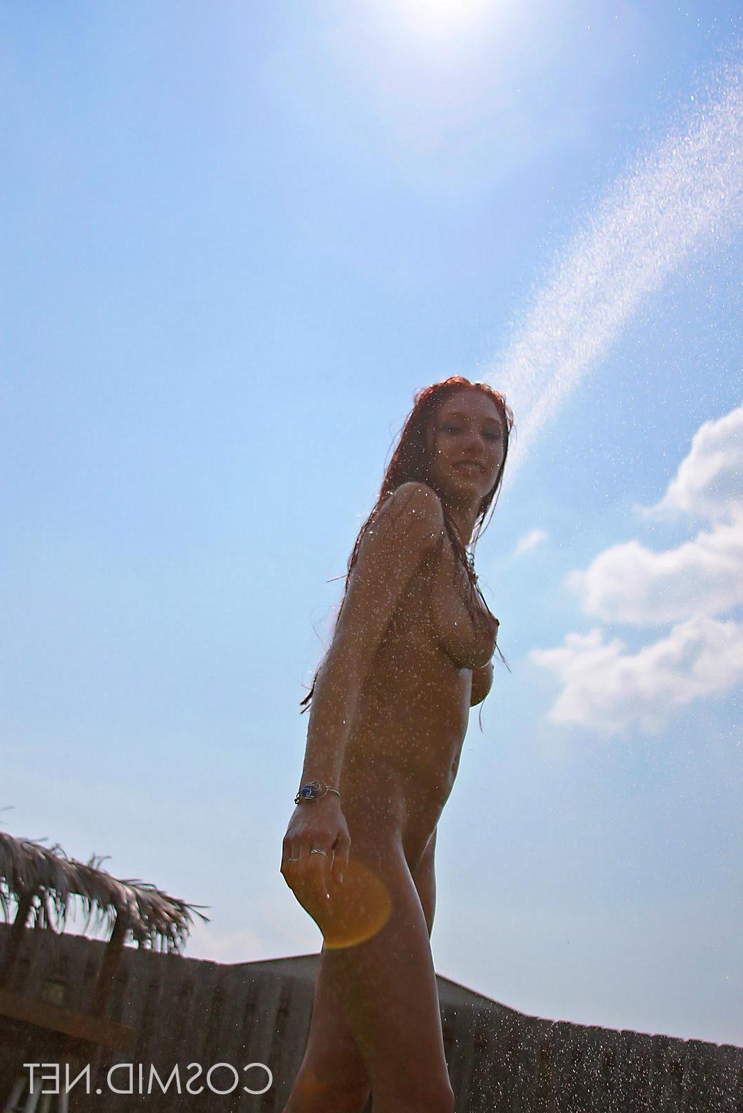 16P Gorgeous redhead Victoria Nelson gets all wet in her ripped jeans