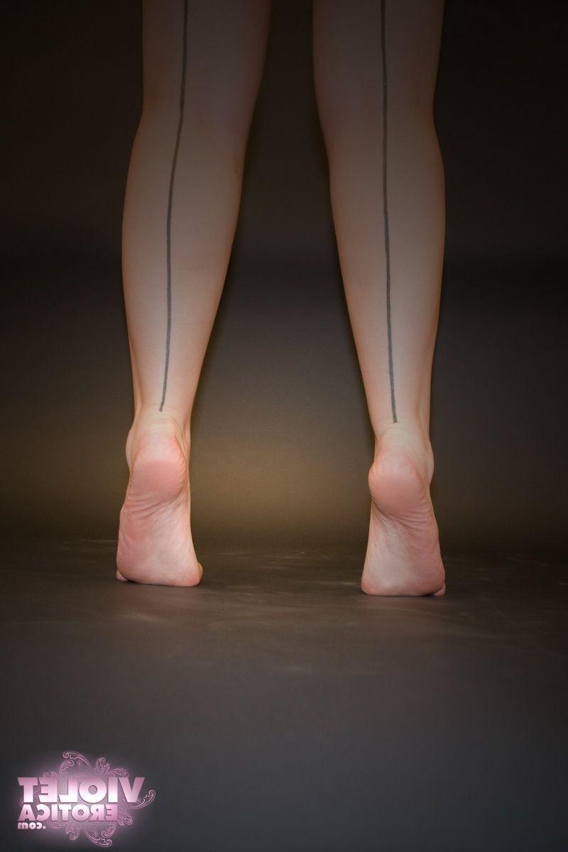 15P Pictures of Violet Erotica giving you some foot fetish action