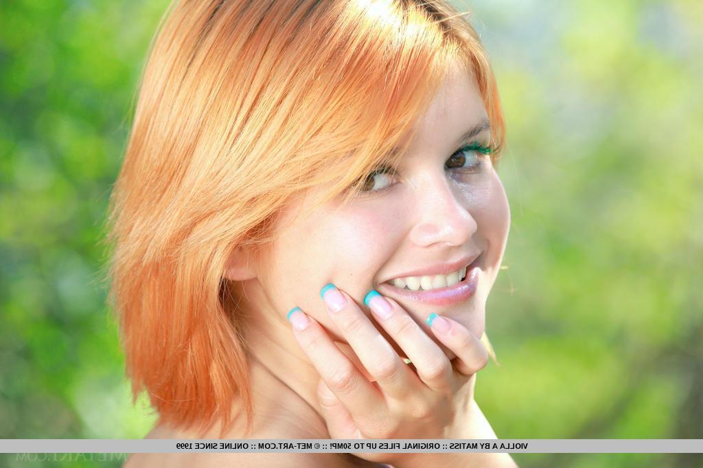 18P Gorgeous redhead teen Violla A strips naked for you in the woods