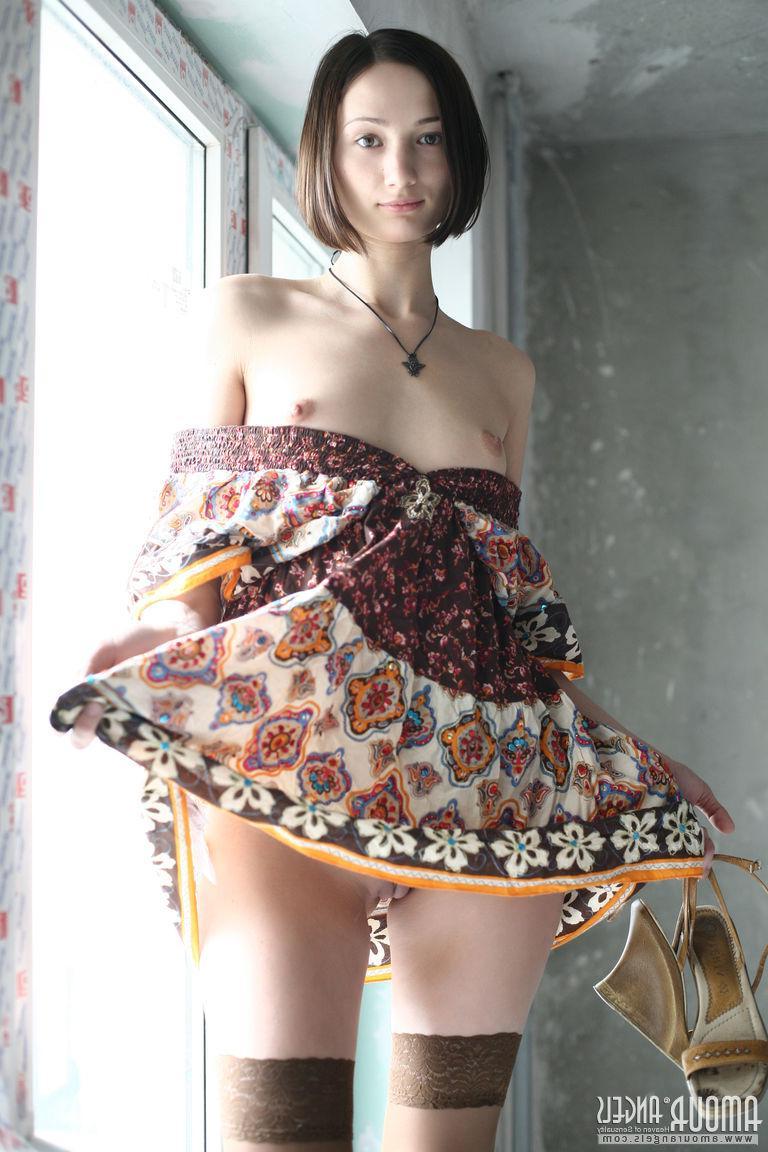 20P Brunette babe Masha gives you her tight pussy by the window