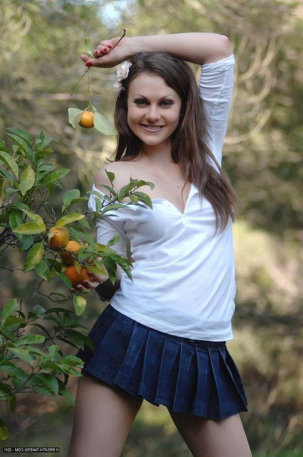 14P Pictures of a sexy teen breath-taker getting nude outside