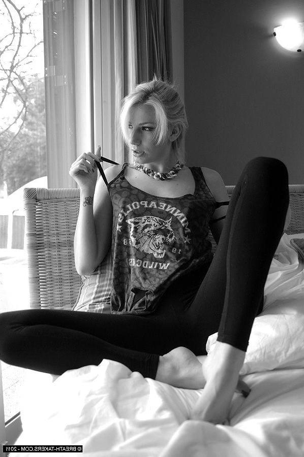 14P Pictures of a hot blonde girl stripping in black and white
